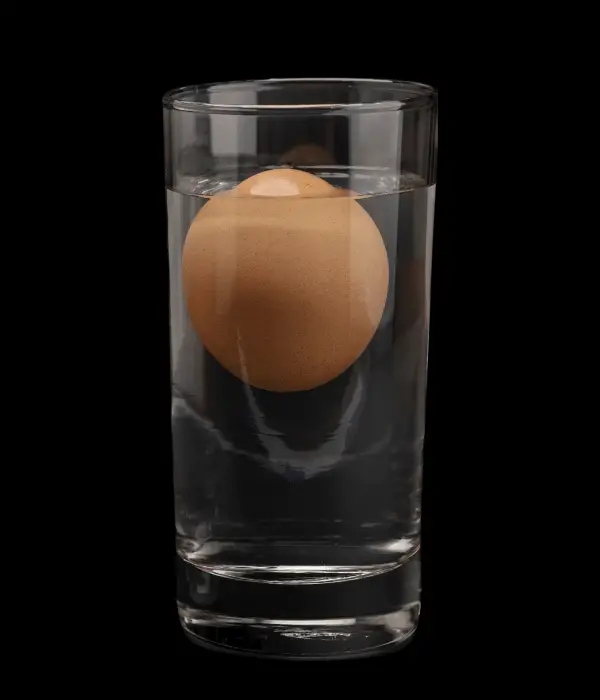 An old egg can float to the top and have a large air cell.