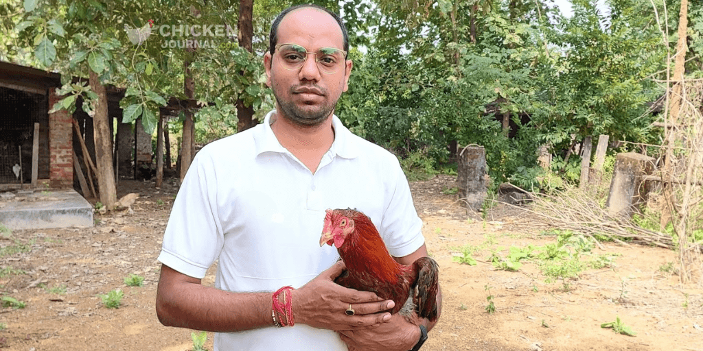 Bijaya Kumar with an Aseel rooster